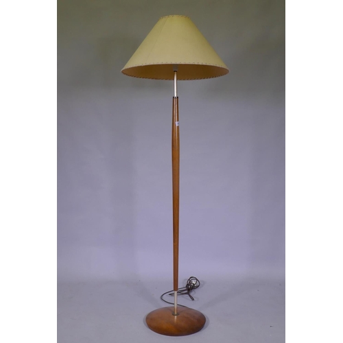 1088 - A mid century teak standard lamp, 145cm high