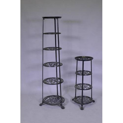 1092 - A painted metal pot stand, 123cm high, and another smaller