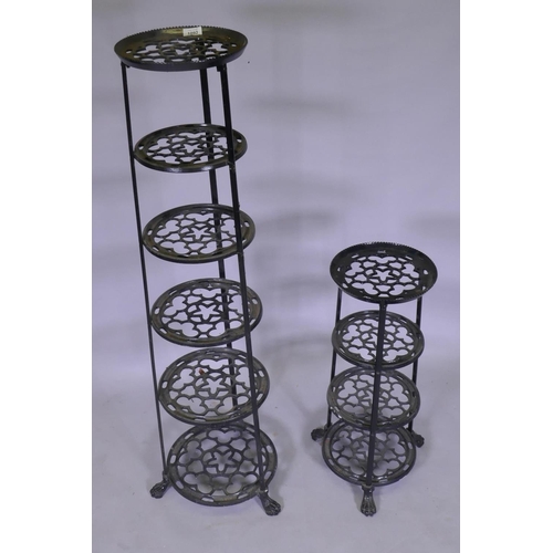 1092 - A painted metal pot stand, 123cm high, and another smaller