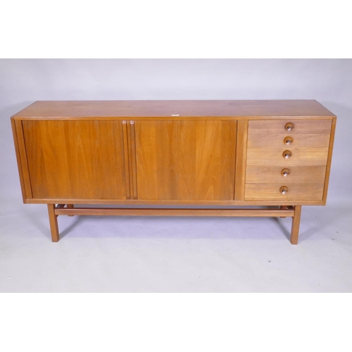 1098 - A mid century Scandinavian teak 'Oden' sideboard by Nils Johsson for Troeds, with tambour front and ... 