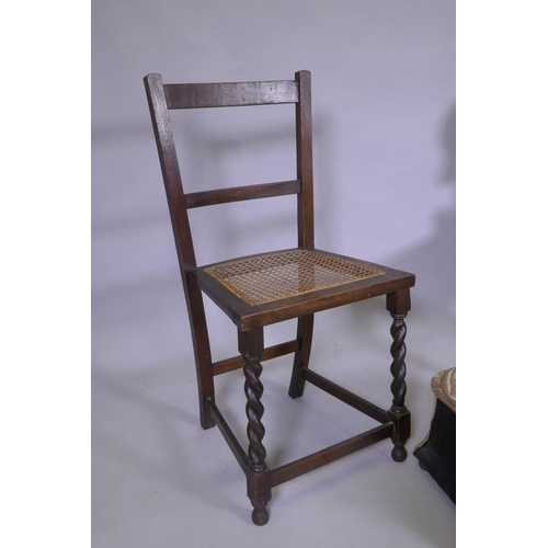 1099 - An early C19th mahogany hall chair, a Victorian ottoman style footstool with lift up top, an Edwardi... 