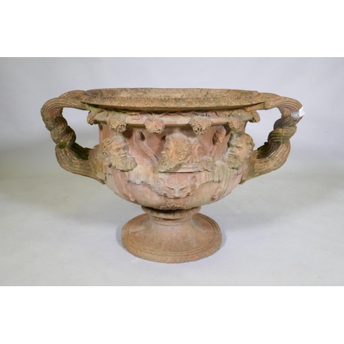 1101 - A terracotta garden urn in the form of the Warwick Vase, after the antique, 58cm diameter x 50cm hig... 