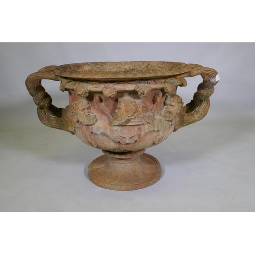 1101 - A terracotta garden urn in the form of the Warwick Vase, after the antique, 58cm diameter x 50cm hig... 