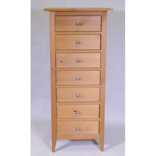 1107 - A contemporary seven drawer pine chest, 53 x 42 x 121cm