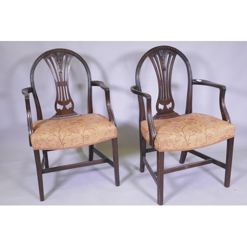 1109 - A pair of Hepplewhite style arm chairs, a pair of Victorian side-chairs, with carved and pierced bac... 