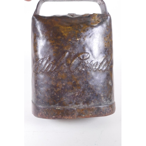 111 - An antique continental cow bell, 14 x 19cm