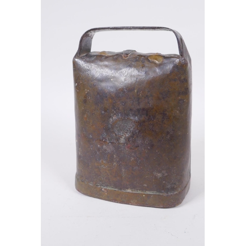 111 - An antique continental cow bell, 14 x 19cm