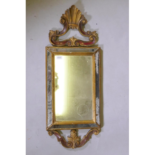 1117 - A Venetian painted and giltwood cushion shaped wall mirror, early C20th, 35 x 90cm