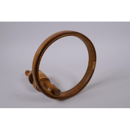 112 - An antique embroidery/lace makers hoop with a table clamp attachment, 19cm diameter