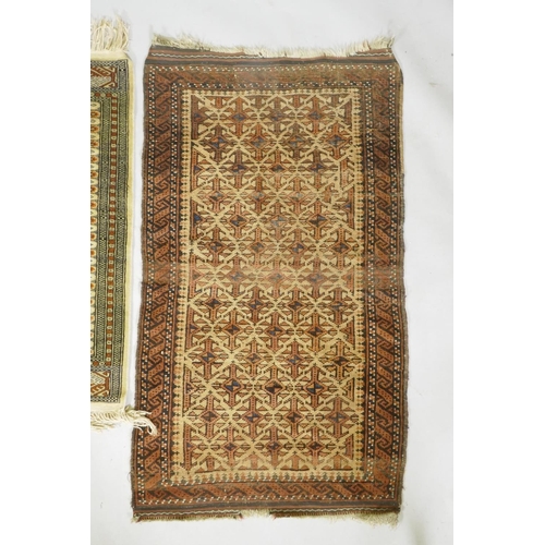 1121 - A gold ground Bokhara rug, and an Iranian rust and cream ground wool rug with an allover geometric d... 