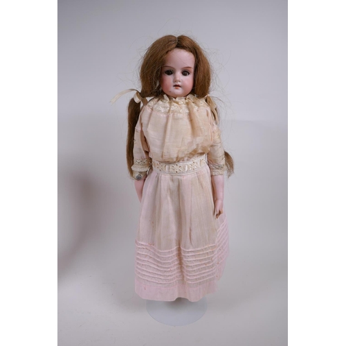 115 - An Armand Marseille bisque headed doll, No 370 5/0, with sleeping eyes, circa 1900, together with a ... 