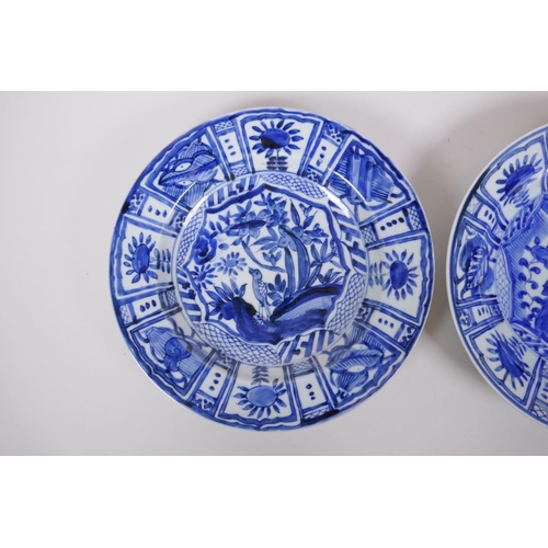 116 - A pair of Chinese blue and white Kraak porcelain cabinet plates decorated with insects and birds amo... 