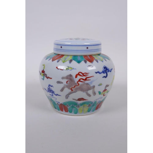 118 - A Chinese Wucai porcelain ginger jar and cover decorated with mythical creatures, character mark to ... 