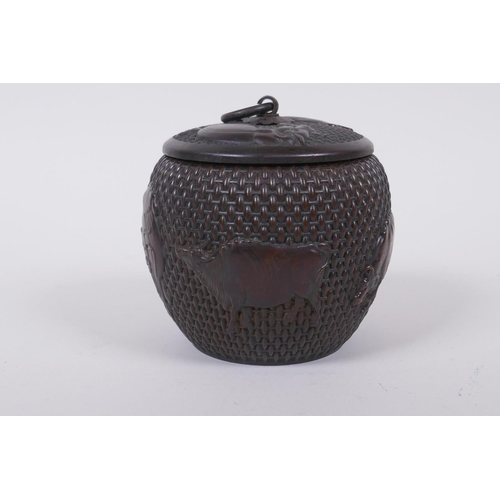 120 - A Chinese bronze jar and cover of basket form, with water buffalo decoration, impressed Xuande 4 cha... 