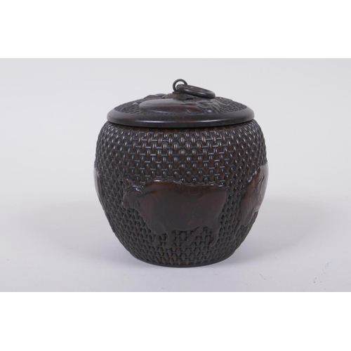 120 - A Chinese bronze jar and cover of basket form, with water buffalo decoration, impressed Xuande 4 cha... 