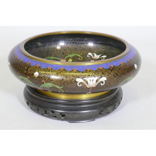 122 - A Chinese cloisonne famille noire enamel bowl, four character mark to base, early C20th, 26cm diamet... 