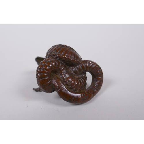 125 - A Japanese style bronze okimono cobra, mark to base, 4cm high