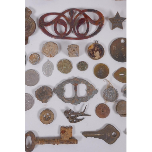 128 - A quantity of detectorist finds including Roman coins, buckles, mounts, shell casings etc