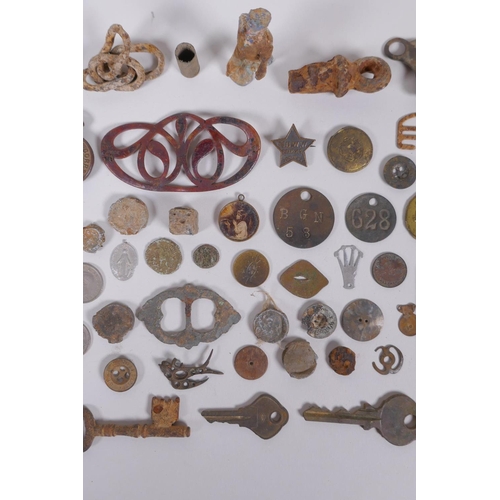 128 - A quantity of detectorist finds including Roman coins, buckles, mounts, shell casings etc