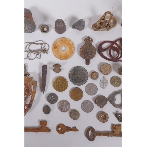 128 - A quantity of detectorist finds including Roman coins, buckles, mounts, shell casings etc