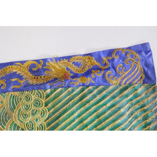 19 - A Chinese late Qing embroidered silk dragon robe, with gilt thread highlights, 192 x 146cm