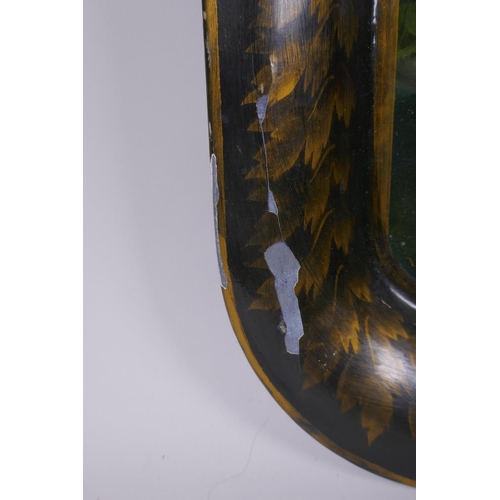 214 - A Toleware tray with painted decoration of a rural ruin, and another larger, 76 x 54cm