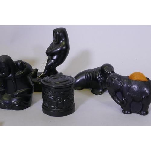 23 - A collection of Boma Canadian carved figures and others, huntsman with bow 15cm high