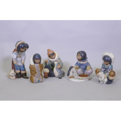 29 - Five Lladro figures of Eskimos, No 12236 Frosty Outing, 28cm high; No 2361, Cold Weather Companions;... 