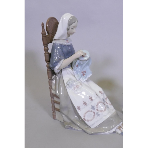 30 - A Lladro  figure, No 04865, Insular Embroiderer, 30cm high; 12140, Pepita with hat; 5655, Arcti... 