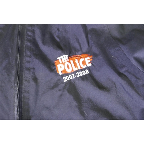 32 - A Police 2007-08 Tour crew jacket, size XL, and an earlier 1983 Tour shirt, size XXL