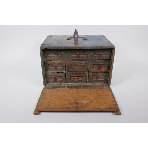 34 - An Indian painted wood box, fitted with drawers, 29 x 23cm, 18cm high