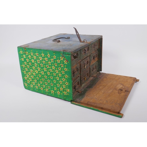 34 - An Indian painted wood box, fitted with drawers, 29 x 23cm, 18cm high