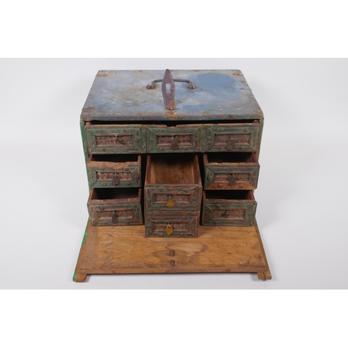 34 - An Indian painted wood box, fitted with drawers, 29 x 23cm, 18cm high