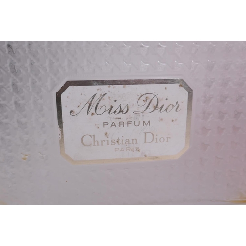 4 - An oversized Christian Dior 'Miss Dior' perfume display bottle, a similar Hermes 'Parfum D'Hermes' d... 