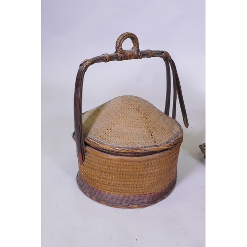 42 - Two antique oriental wicker food baskets and a similar back pack, largest 40cm high