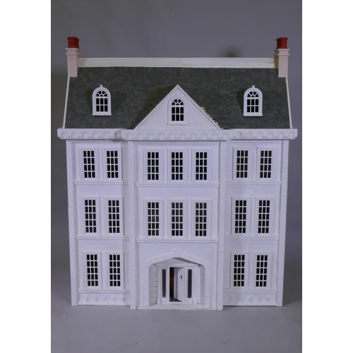 5 - A large dolls' house, Tattershall Manor, in the form of a Georgian town house, the roof folding back... 