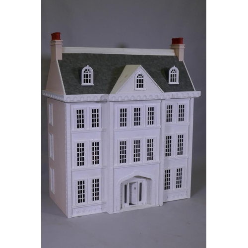 5 - A large dolls' house, Tattershall Manor, in the form of a Georgian town house, the roof folding back... 