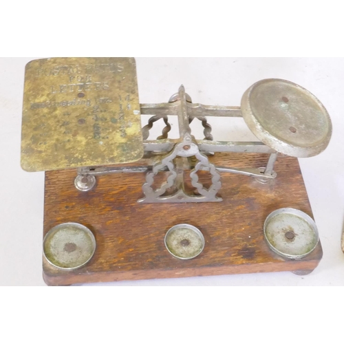 51 - An antique set of weighing scales and a set of postage scales, 28 x 19 x 20cm