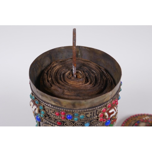 55 - A Tibetan white metal prayer wheel with painted details, set with agate eye beads, turquoise etc, 21... 