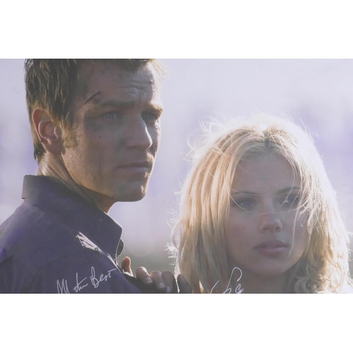 58 - Two posters mounted on card from 'The Island' 2005, signed by Ewan McGregor and Scarlett Johansson, ... 