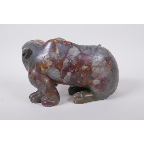 59 - A Chinese carved soapstone tiger, 23cm long