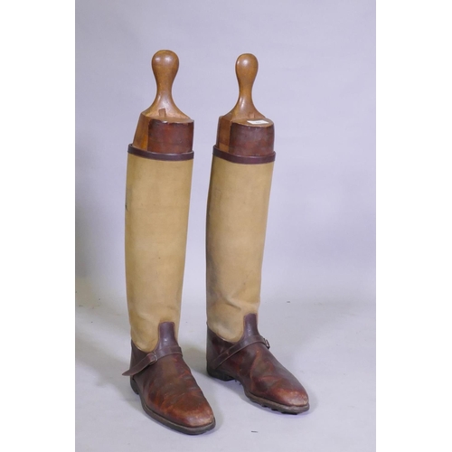 60 - A pair of WWI officer's leather and canvas trench boots with wood lasts, sole length 30cm