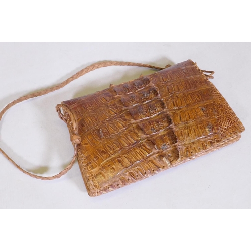 65 - A vintage crocodile hide handbag, 27 x 18cm