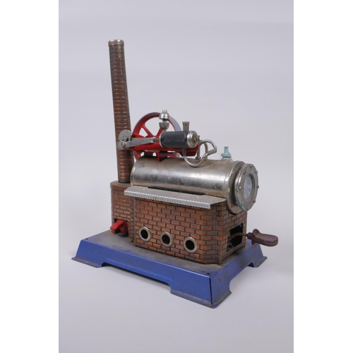 66 - A Wilesco D14 Static Steam Engine, with original operating instructions, 20 x 14cm