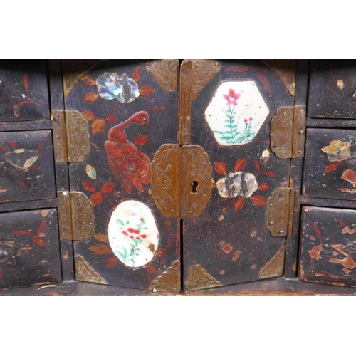 69 - A Japanese Meiji period lacquer table top shodhana with inset porcelain panels, 31 x 14cm, 47cm high