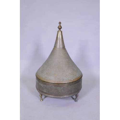 7 - An antique Indo Persian brass brasserie and conical cover, raised on tripod supports, with chased an... 