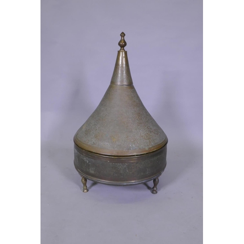 7 - An antique Indo Persian brass brasserie and conical cover, raised on tripod supports, with chased an... 