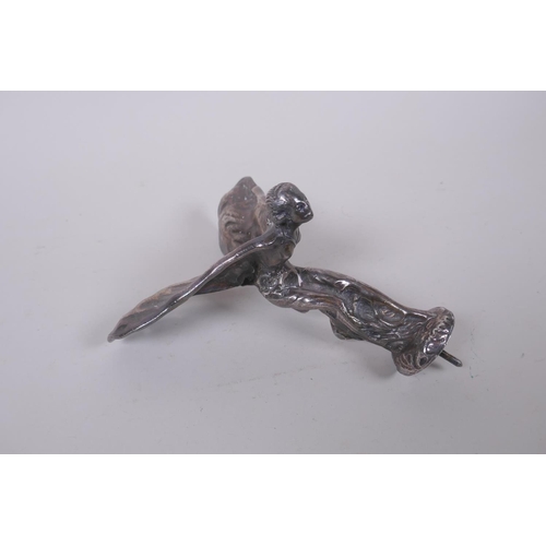 71 - A cast white metal Spirit of Ecstasy hood ornament, 13cm high