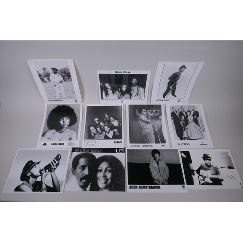 76 - A quantity of black and white press and promotional photographs of black musicians including WAR, Ja... 