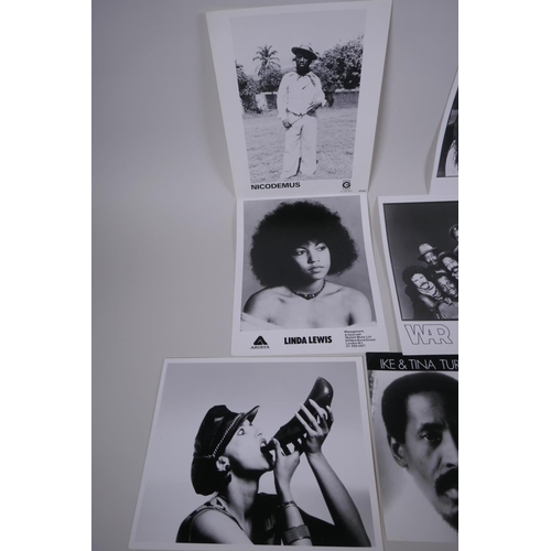 76 - A quantity of black and white press and promotional photographs of black musicians including WAR, Ja... 